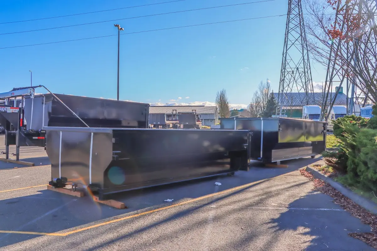 Roll-off dumpster ready for waste disposal at job site for Yard Waste Dumpster Rental in St. Rose